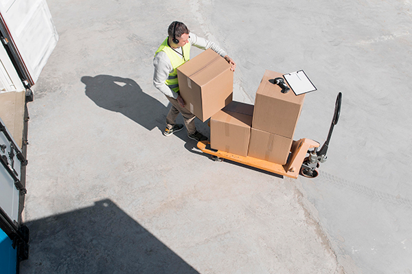 full shot man carrying box