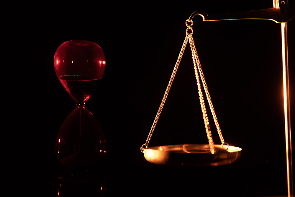 legal law concept image scales of justice and case books on desk